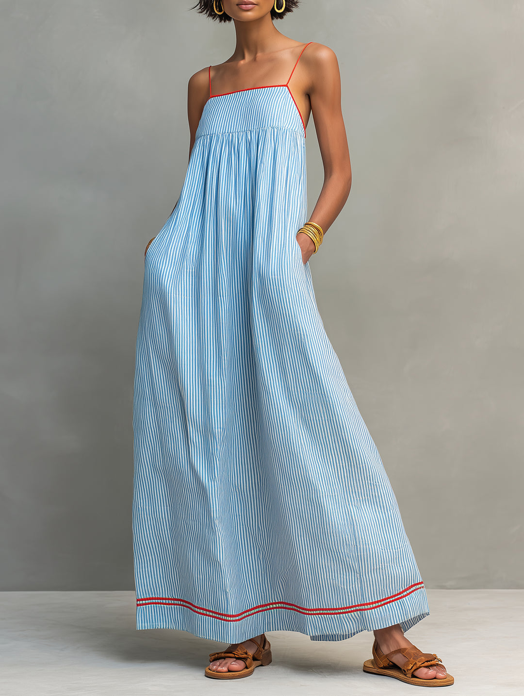 Robe longue rayée avec passepoil rouge