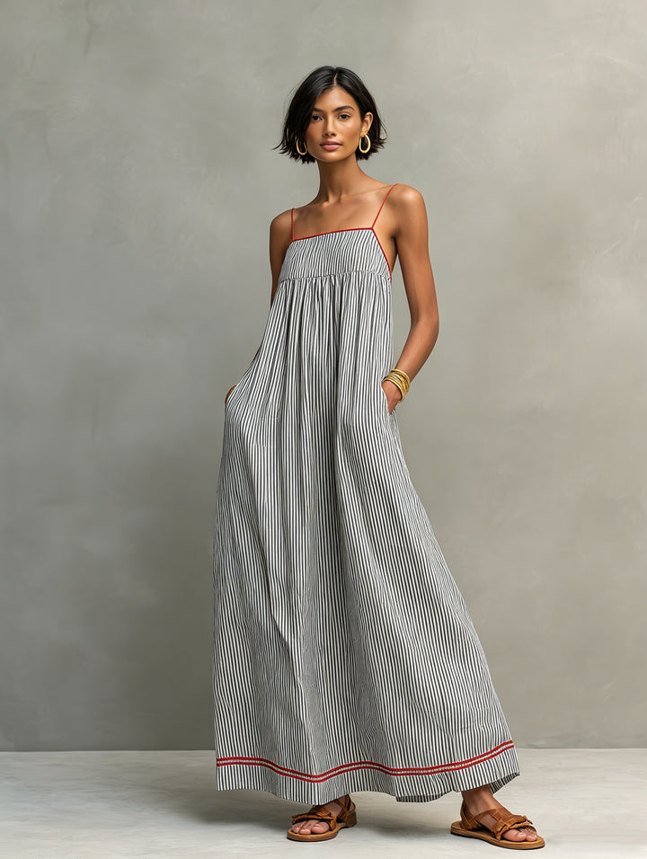 Robe longue rayée avec passepoil rouge