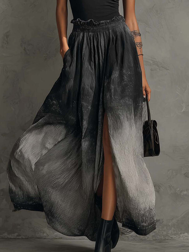 Sort off-shoulder top med flæser og gradient plisseret maxinederdel sæt