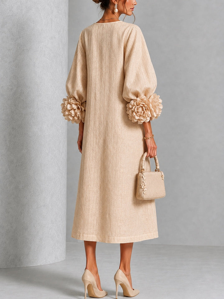 Robe midi fleurie à poignets boutonnés