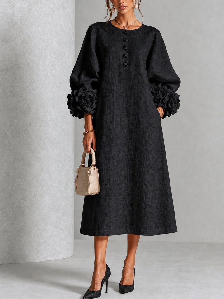 Robe midi fleurie à poignets boutonnés