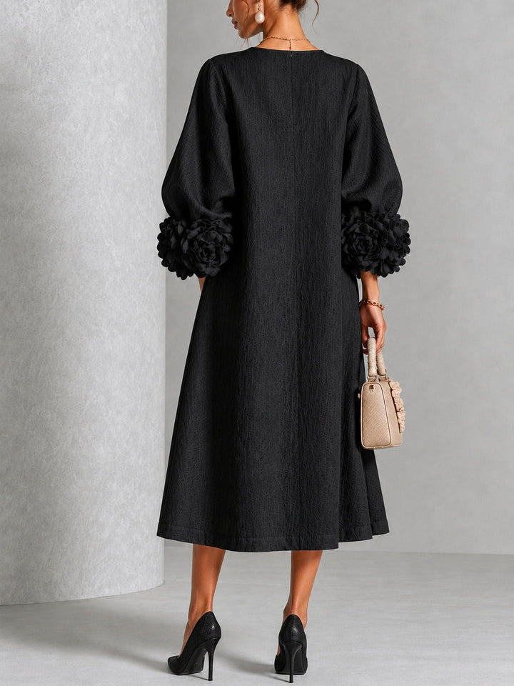 Robe midi fleurie à poignets boutonnés
