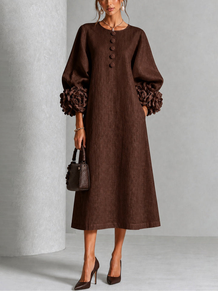 Robe midi fleurie à poignets boutonnés