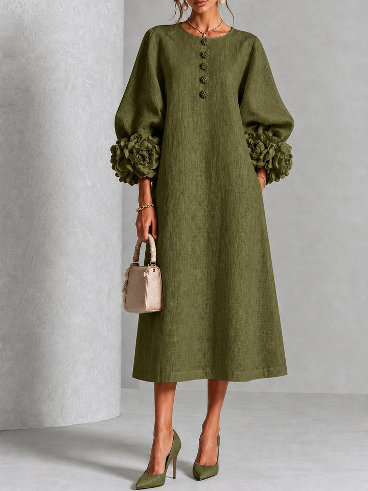 Robe midi fleurie à poignets boutonnés