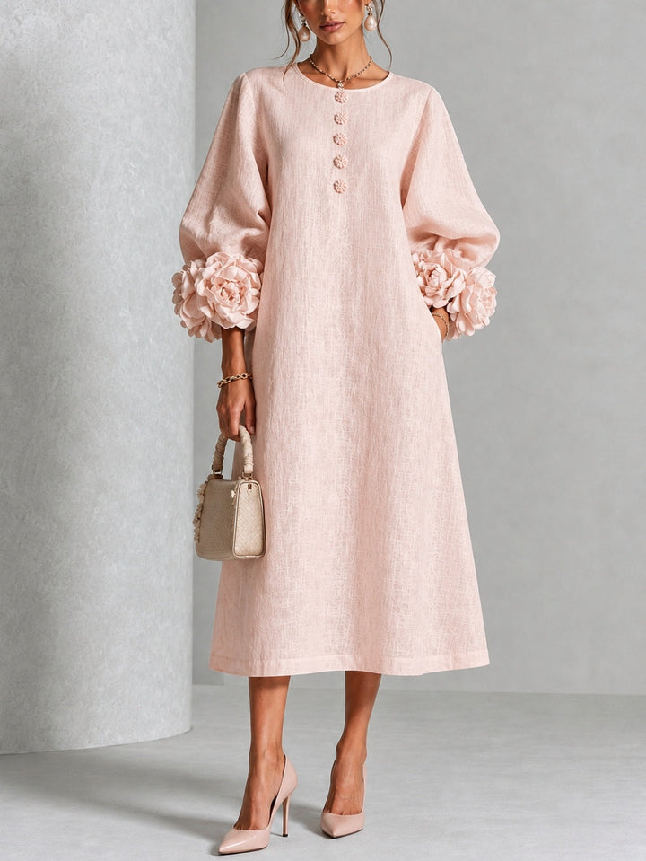 Robe midi fleurie à poignets boutonnés