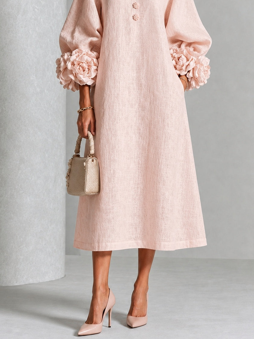 Robe midi fleurie à poignets boutonnés