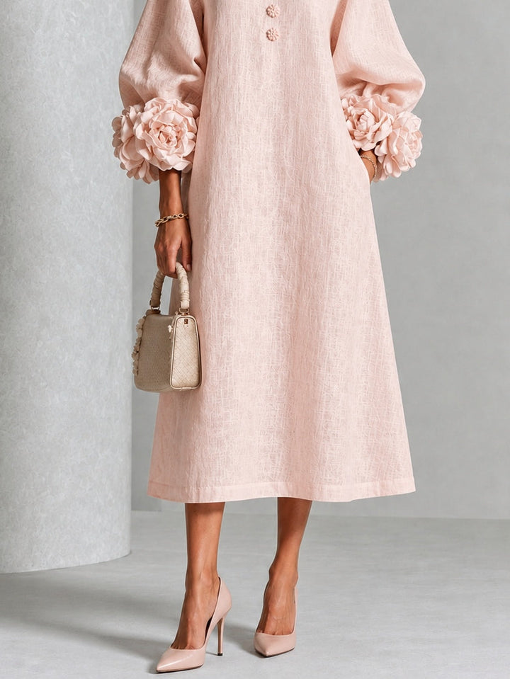 Robe midi fleurie à poignets boutonnés