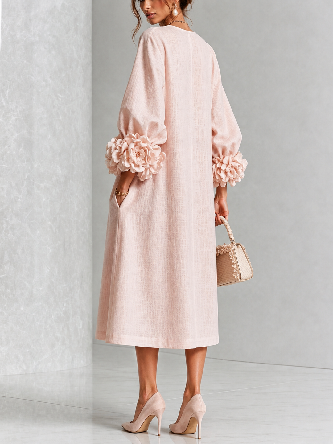 Robe midi fleurie à poignets boutonnés