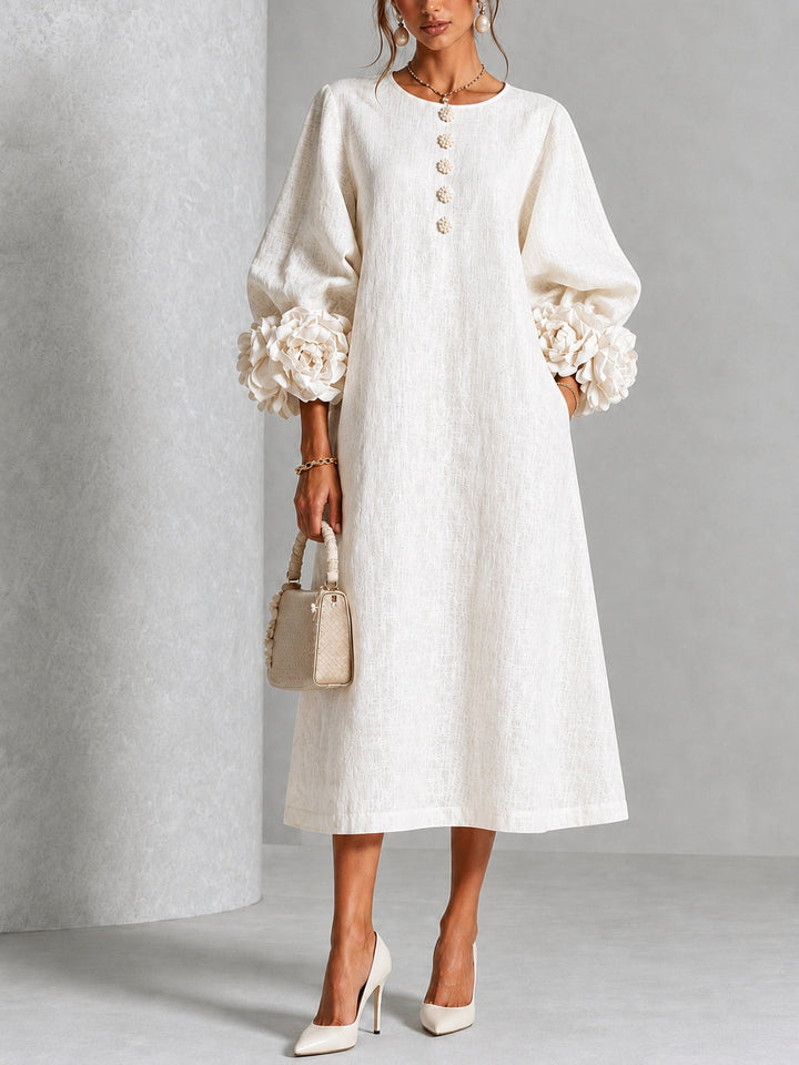 Robe midi fleurie à poignets boutonnés